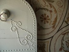 Studded door and mosaic, El Jem Museum, El Djem, Tunisia, 2009. Creator: Amanda Waite.