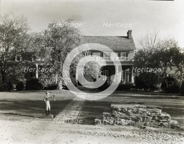 Unidentified brick house, possibly in Virginia, between 1910 and 1935. Creator: Frances Benjamin Johnston.
