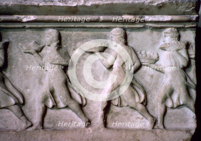 Greek relief of servants carrying food. Artist: Unknown