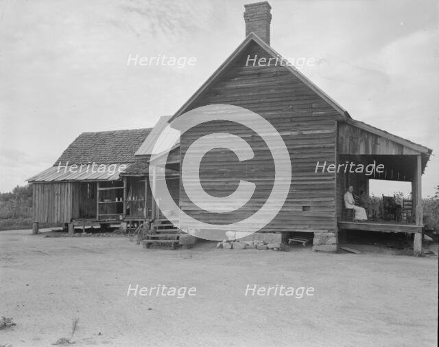 Home of farmer who has raised cotton for fifty years on his own land, Greene County, Georgia, 1937. Creator: Dorothea Lange.