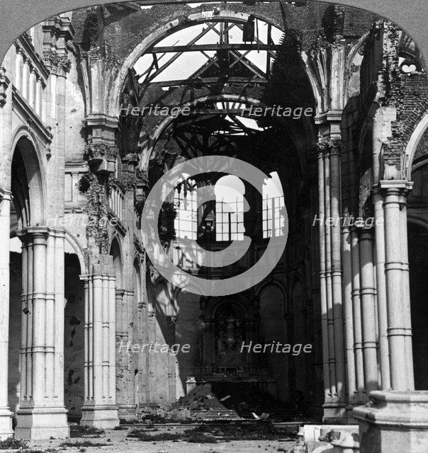 Damage to the Church of Notre Dame, Armentieres, France, World War I, 1918.Artist: Realistic Travels Publishers