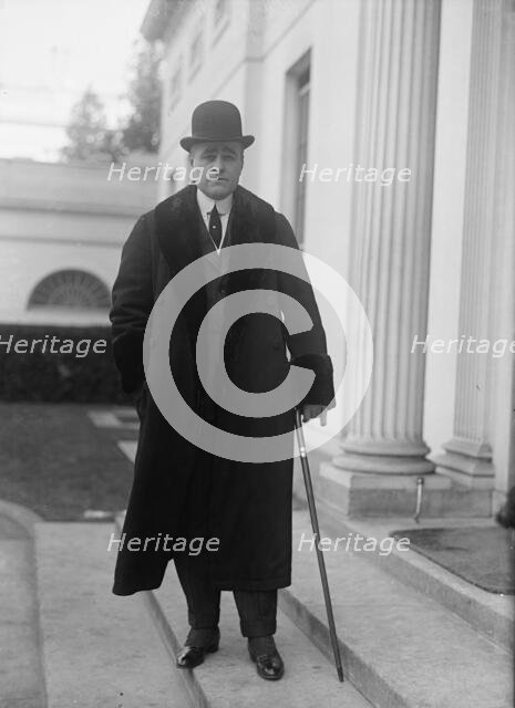 Raymond T. Baker, U.S. Mint, 1917. Creator: Harris & Ewing.