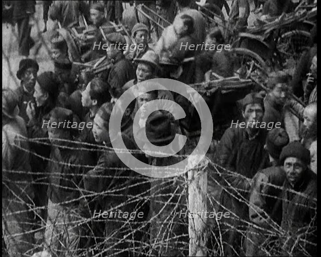 Chinese Refugees in the International Settlement in Shanghai, 1920s. Creator: British Pathe Ltd.