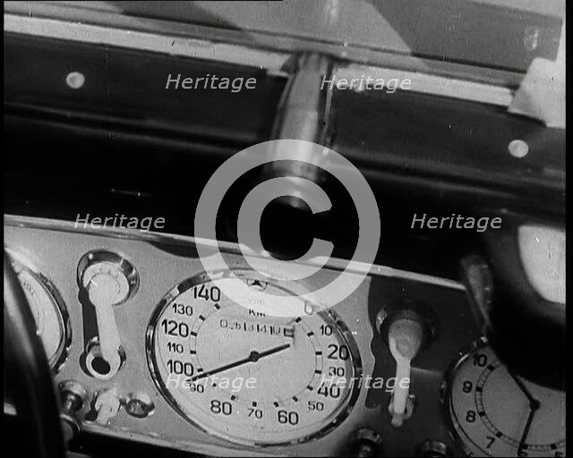 The Dashboard of a Car Showing the Speed of the Vehicle As Ninety-Eight Kilometres an Hour, 1937. Creator: British Pathe Ltd.
