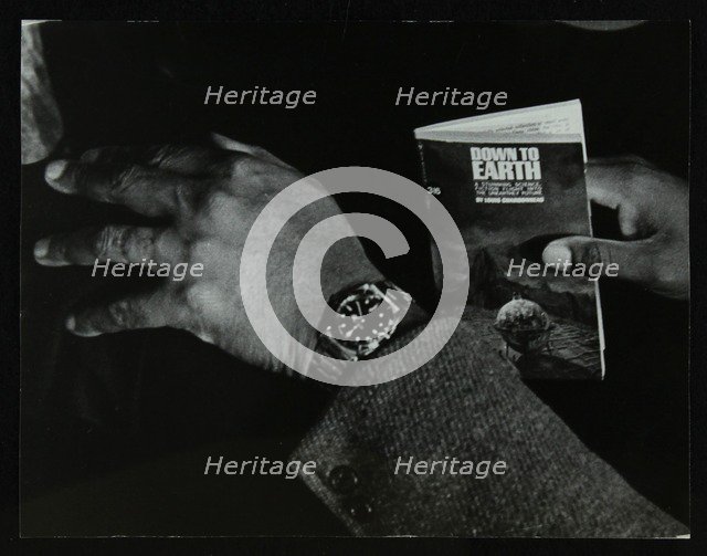 The hands and book of American double bassist Eddie Jones, Welwyn Garden City, Hertfordshire, 1967. Artist: Denis Williams