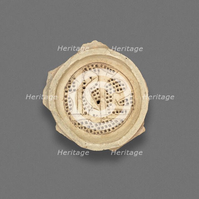 Clay filter with calligraphic design, Fatimid dynasty (969-1171), 11th-12th century. Creator: Unknown.