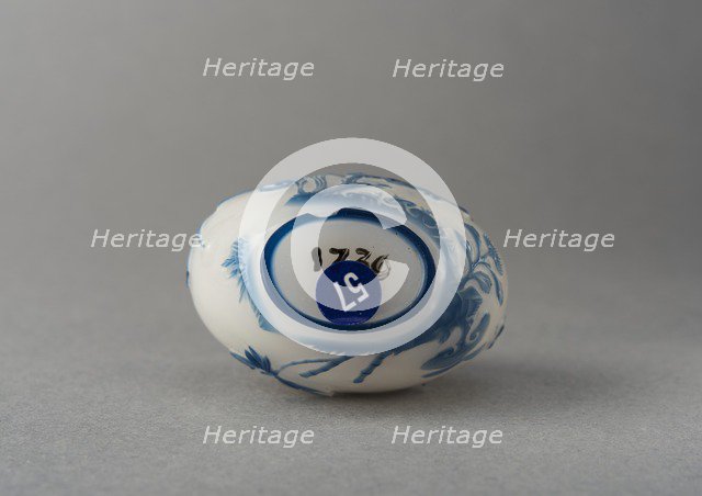 White glass snuff bottle with blue overlay, China, Qing dynasty, 1644-1911. Creator: Unknown.