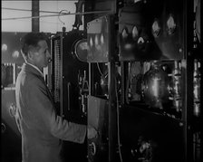 Scottish Engineer and Television Innovator John Logie Baird Testing Television Transmitting...,1920s Creator: British Pathe Ltd.