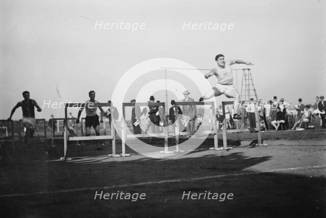 J.J. Eller wins 120 yd. Hurdle 1911, 1911. Creator: Bain News Service.