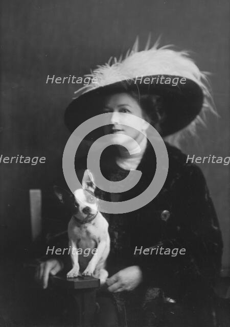 Brooks, Anita, Miss, with dog, portrait photograph, 1917 or 1918. Creator: Arnold Genthe.