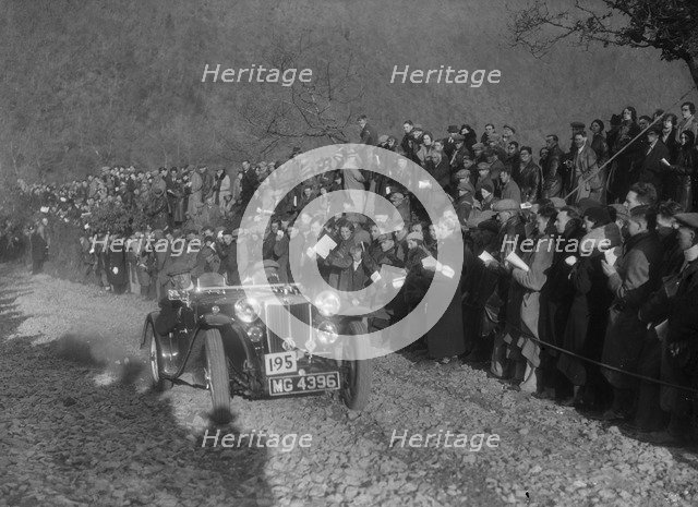 MG PB of FCN Day competing in the MCC Lands End Trial, Beggars Roost, Devon, 1936. Artist: Bill Brunell.