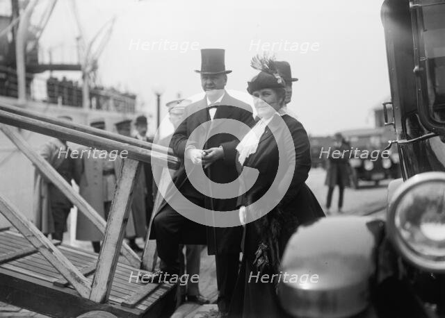 Mrs. Josephus Daniels,with Sec. Daniels Boarding Mayflower. Allied Commission, 1917. Creator: Harris & Ewing.