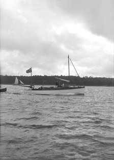 The motorboat 'Maga' under way, 1913. Creator: Kirk & Sons of Cowes.