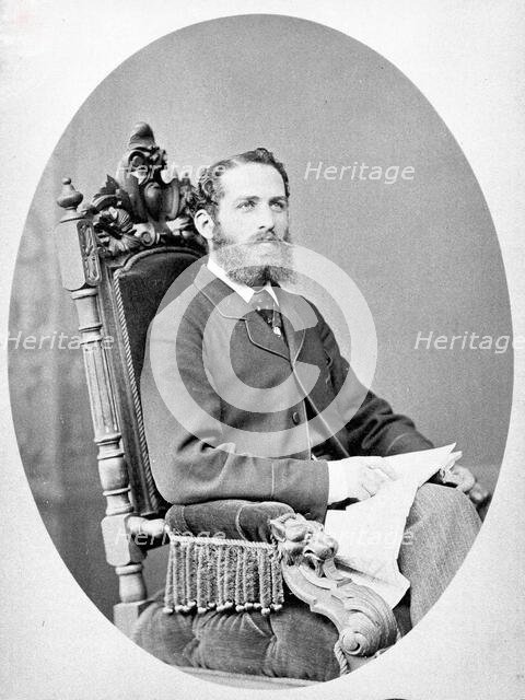 Arthur Schuster, seated, facing left, aged about 38, c1888. Creator: L Suscipj.