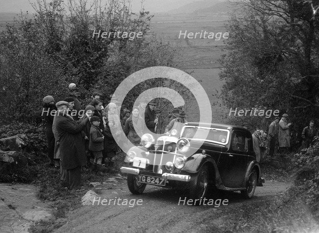 1934 Standard Avon Ten coupe taking part in a Standard Car Owners Club trial. Artist: Bill Brunell.