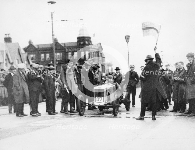 Archie Frazer-Nash waiting at the start of a motor racing event. Artist: Unknown