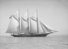The three-mast auxiliary schooner 'Invincible', 1911. Creator: Kirk & Sons of Cowes.
