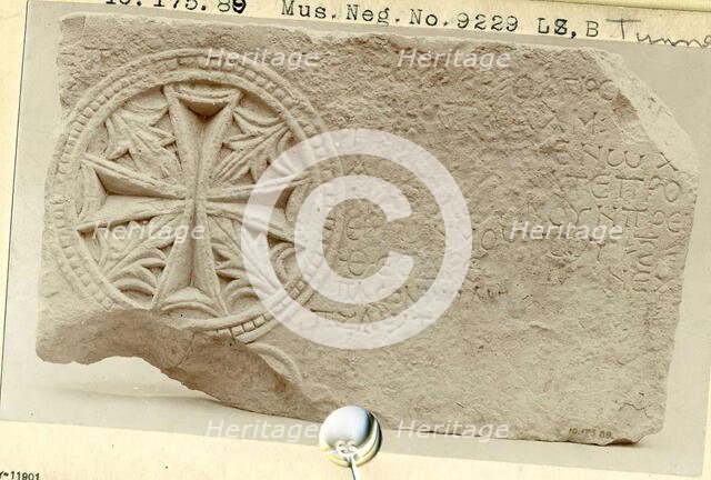 Fragment from a Funerary Stele with a Medallion of a Cross and Leaves, Egypt, 6th-7th century. Creator: Unknown.
