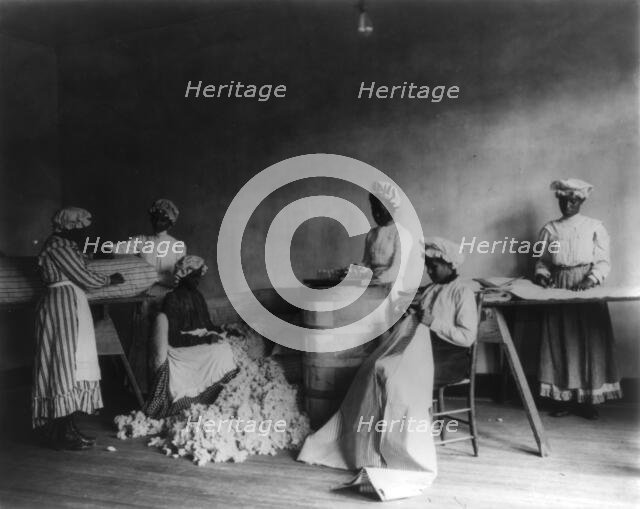 African American students in mattress-making class, Tuskegee Institute, Tuskegee, Alabama, 1902. Creator: Frances Benjamin Johnston.