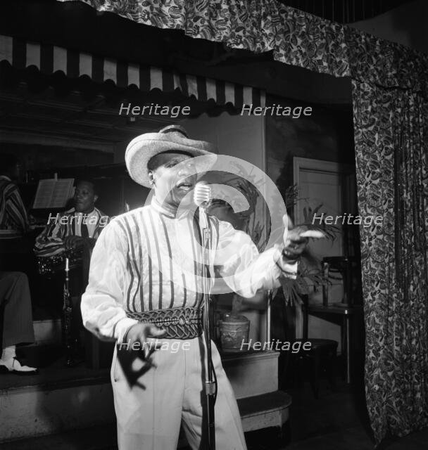 Portrait of Wilmoth Houdini, Renaissance Ballroom, New York, N.Y., ca. July, 1947. Creator: William Paul Gottlieb.