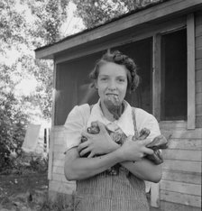 Possibly: Mrs. Schrock takes good care of her family, Yakima Valley, Washington (near Wapato), 1939. Creator: Dorothea Lange.