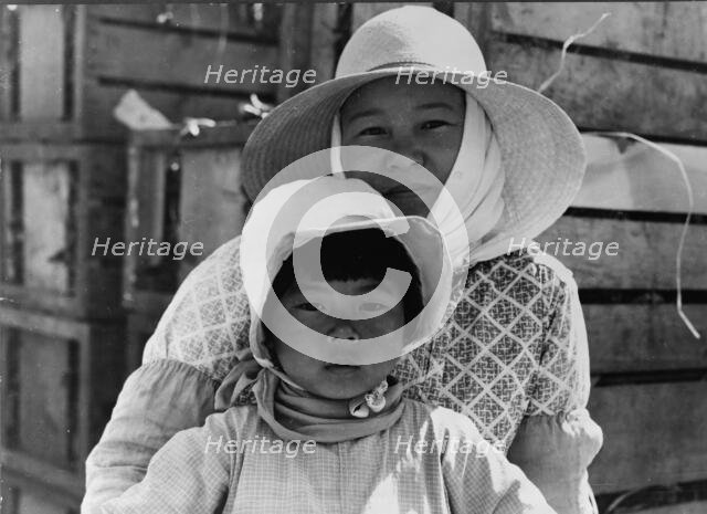Japanese mother and daughter, agricultural workers near Guadalupe, California, 1937. Creator: Dorothea Lange.