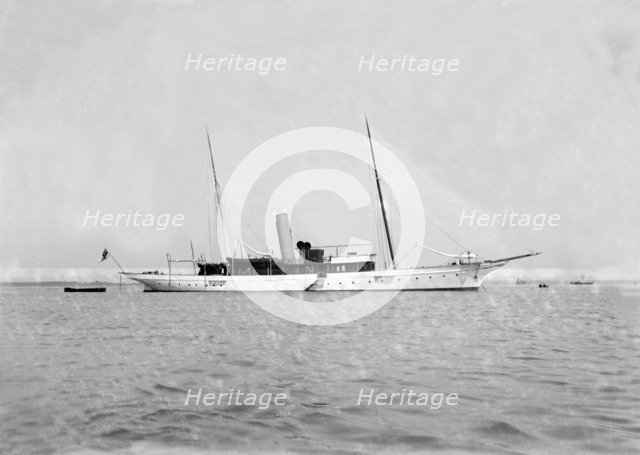The steam yacht 'Grainaig' at anchor. Creator: Kirk & Sons of Cowes.