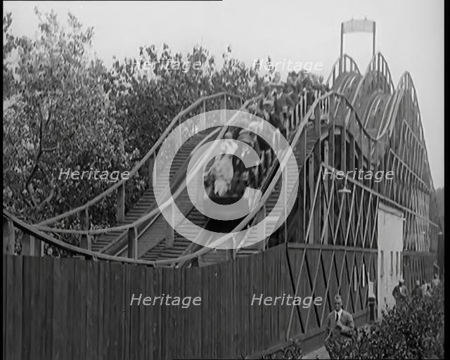 A Large Group of Female Civilians Enjoying  a Roller Coaster Ride, 1926. Creator: British Pathe Ltd.