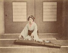 Japanese Woman Playing a Koto, 1865-1875. Creator: Unknown.