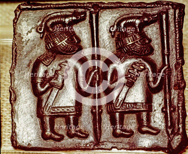 Bronze Matrix for making decorative peaques for helmets, 8th century. Artist: Unknown.