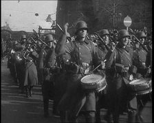 A German Military Band Marching Through the Rhineland, 1936. Creator: British Pathe Ltd.