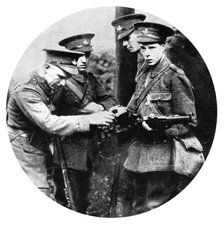 The Prince of Wales loading a rifle in the Grenadiers, First World War, 1914. Artist: Unknown