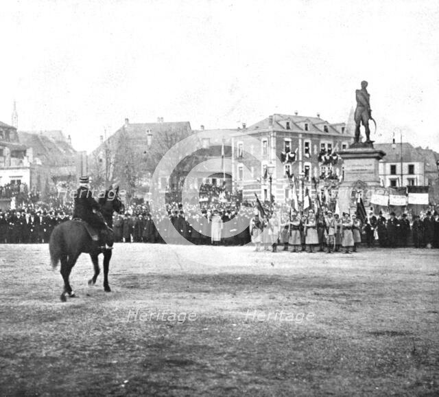 'Notre entrée a Colmar; Les generaux de Castelnau et Hirschauer passant devant...', 1918. Creator: Unknown.