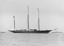 The three mast auxiliary sailing yacht 'Utopia' at anchor, 1913. Creator: Kirk & Sons of Cowes.