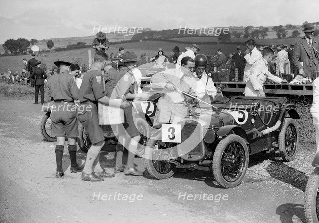 Austin Ulsters of SV Holbrook and GE Caldicutt at the RAC TT Race, Ards Circuit, Belfast, 1929 Artist: Bill Brunell.