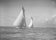 The 19-metre class 'Mariquita' & 'Corona' race downwind under spinnaker, 1911. Creator: Kirk & Sons of Cowes.