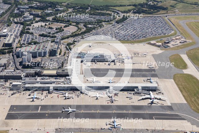 Aeroplanes at Terminals One and Two at Birmingham International Airport, West Midlands, 2018. Creator: Historic England.