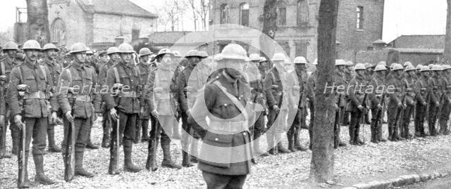 ''Aux armees Britanniques; Le nouveau casque anglais', 1916 (1924) Creator: Unknown.