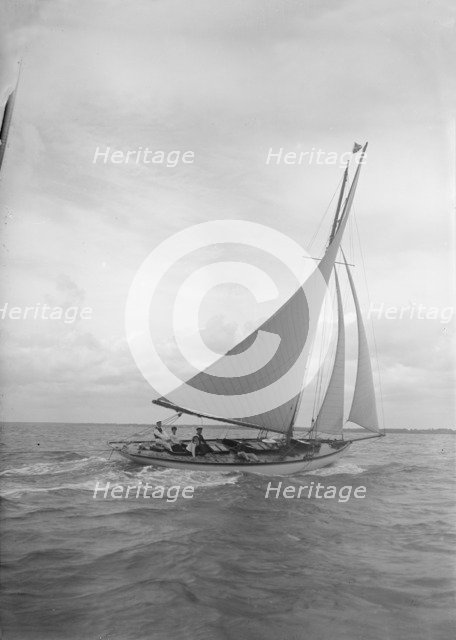 The cutter 'Nanette' sailing close-hauled, 1911. Creator: Kirk & Sons of Cowes.