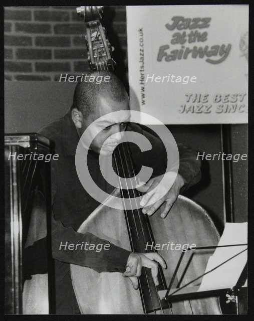 Bassist Gary Crosby playing at The Fairway, Welwyn Garden City, Hertfordshire, 25 January 2004. Artist: Denis Williams