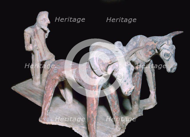 Greek terracotta of a man ploughing, 6th century BC. Artist: Unknown