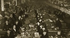 Sorting parcels at the Post Office, Mount Pleasant, London, 20th century. Artist: Unknown
