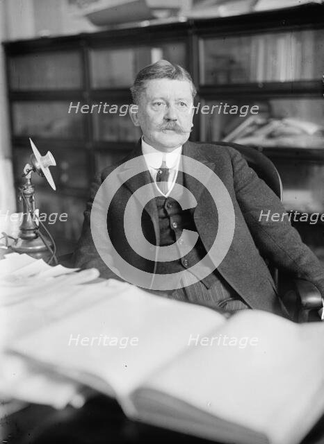 Edward B. Moore, Commissioner of Patents - At Desk, 1912. Creator: Harris & Ewing.