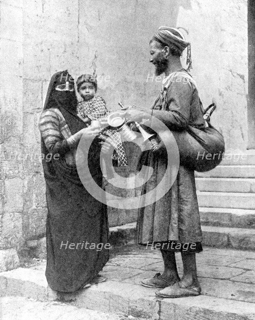 A water seller, Cairo, Egypt, 1936.Artist: Donald McLeish