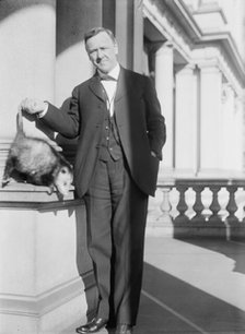 Daniels, Josephus, Secretary of The Navy, 1913-1921. with An Opossum, 1913. Creator: Harris & Ewing.