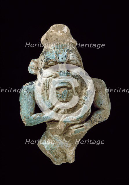 Faience amulet of Bes nursing a Horus, XXVth Dynasty (c770 BC-c715 BC). Artist: Unknown.