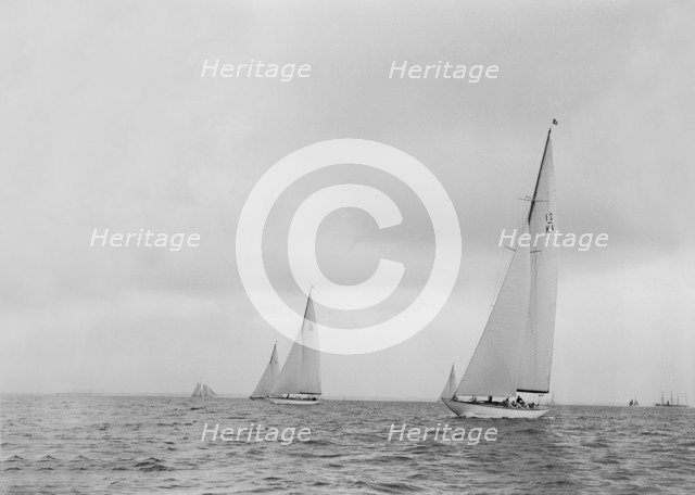 The 12 Metre sailing yacht 'Westra' racing on upwind leg, 1936. Creator: Kirk & Sons of Cowes.