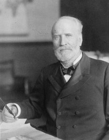 James Wilson, half-length portrait, seated at desk, facing slightly left, c1906. Creator: Frances Benjamin Johnston.