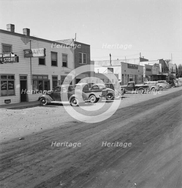 Looking down main street of a frontier town..., Tulelake, Siskiyou County, California, 1939. Creator: Dorothea Lange.