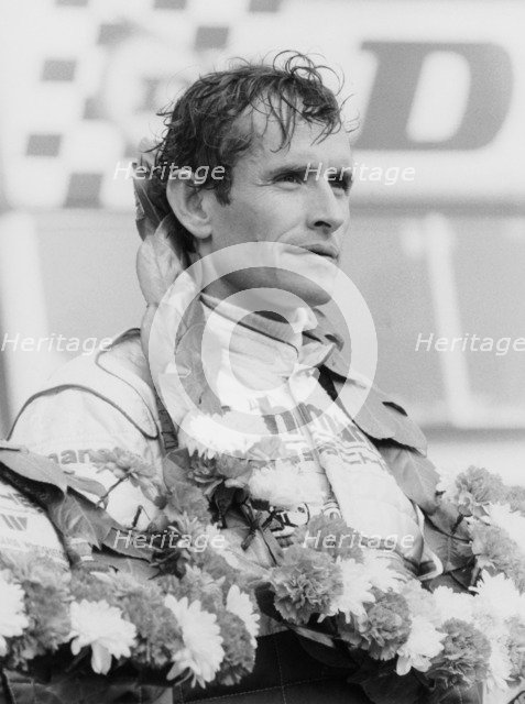 Jacky Ickx after winning the Silverstone 1000km, 1985. Artist: Unknown